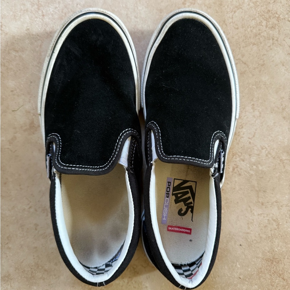 Black suede vans slip on
